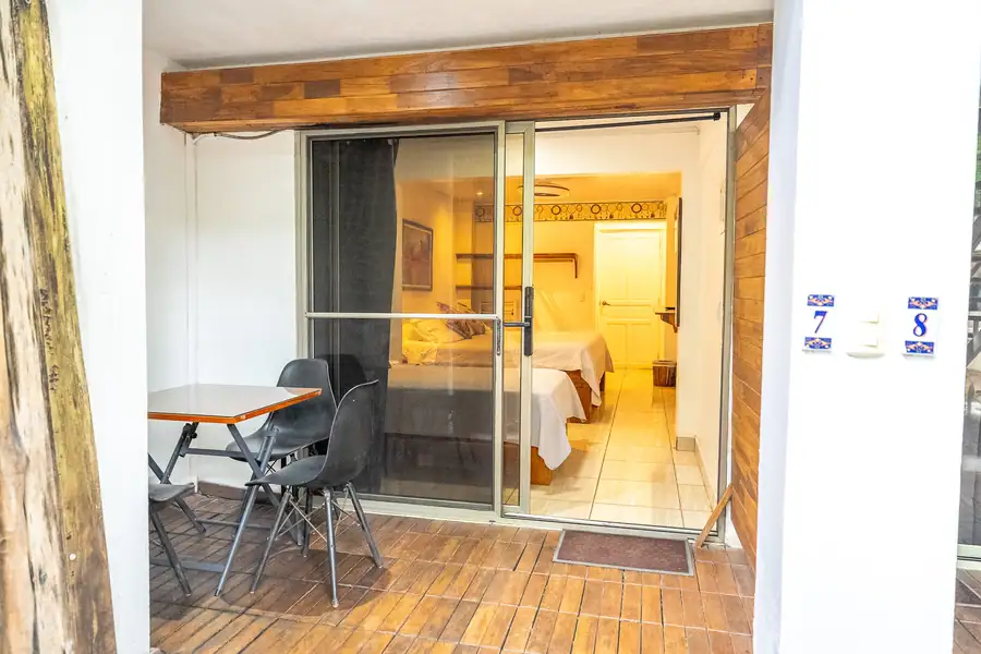 Room 7 opening toward its terrace