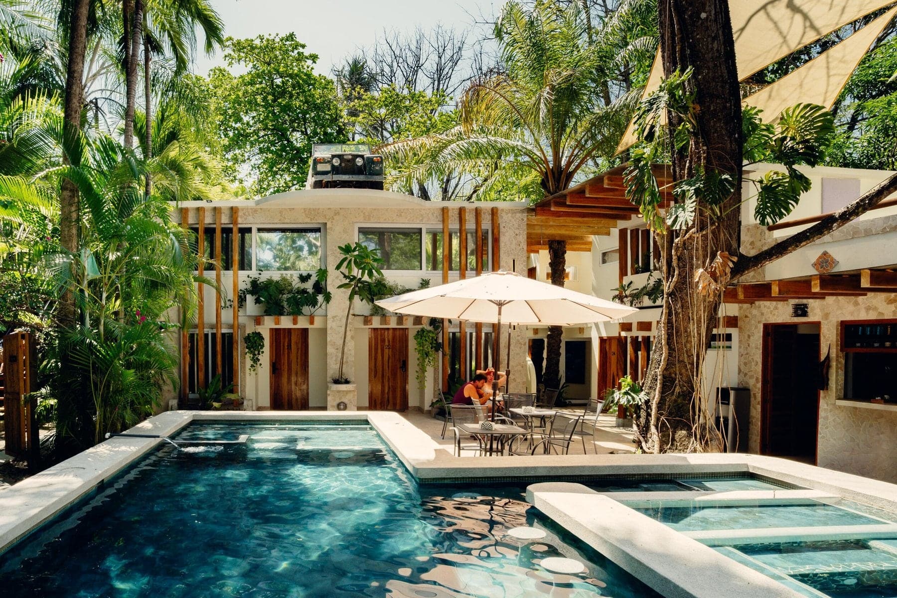 Pool light through the tropical garden